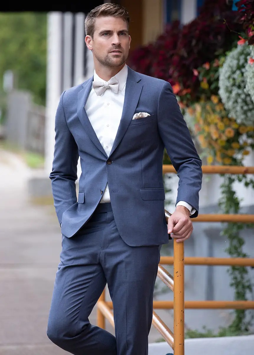 Model wearing a blue tuxedo