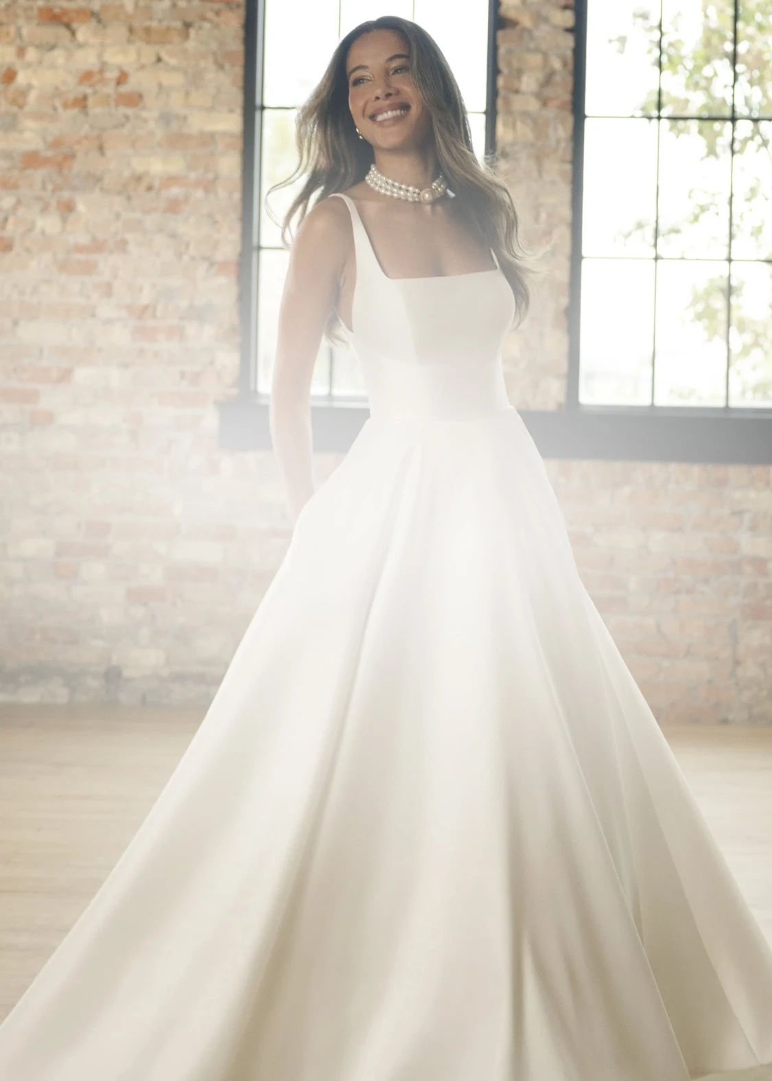 Photos of model wearing romantic style bridal gowns